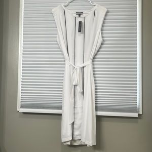 The Limited. White, knee-length, work attire.